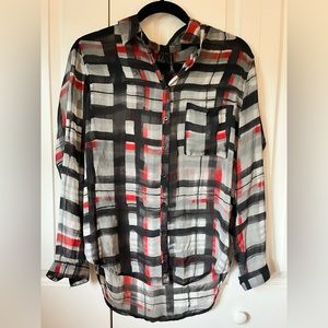 Black, red and white sheer blouse.